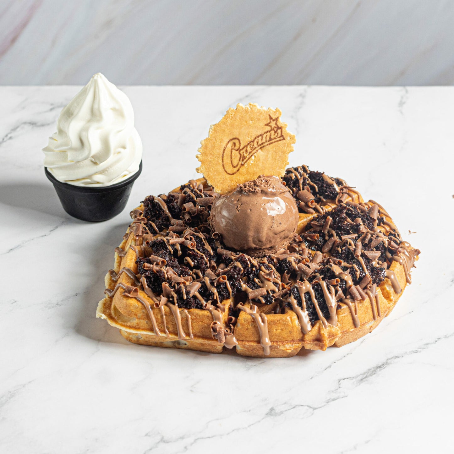 Dessert & Drink for 2 at Creams Cafe Blackburn and Wigan (worth £25)