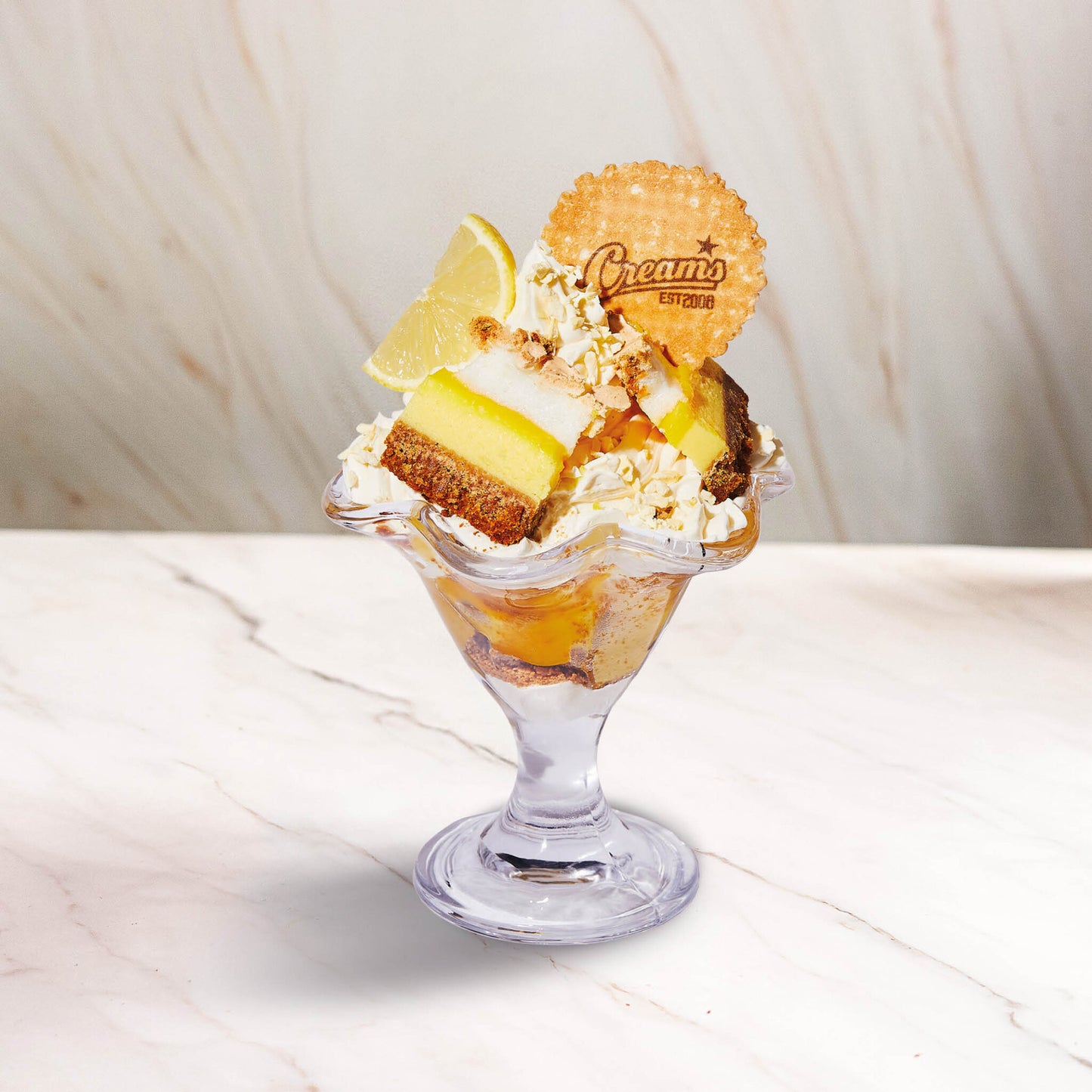 Dessert & Drink for 2 at Creams Cafe Blackburn and Wigan (worth £25)