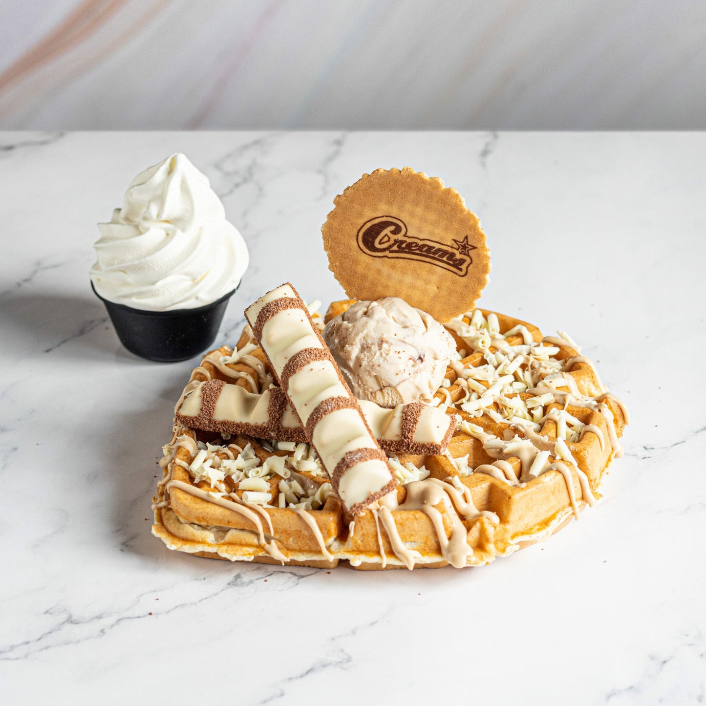 Dessert & Drink for 2 at Creams Cafe Blackburn and Wigan (worth £25)